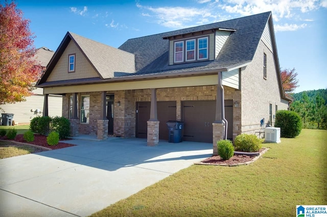 view of front of house with a front yard and cooling unit