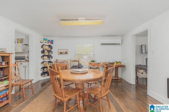 dining space featuring an AC wall unit, ornamental molding, and dark hardwood / wood-style flooring