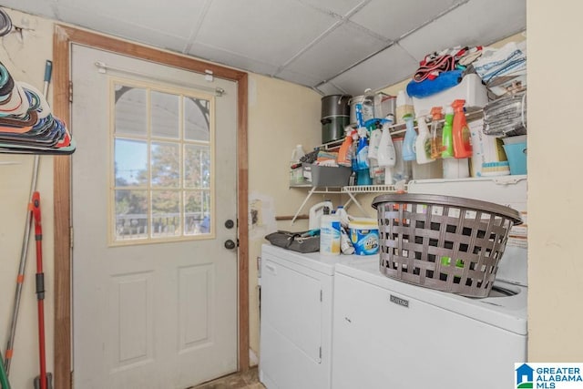 laundry area featuring washing machine and clothes dryer