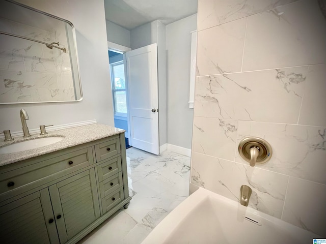 bathroom featuring vanity and bathtub / shower combination