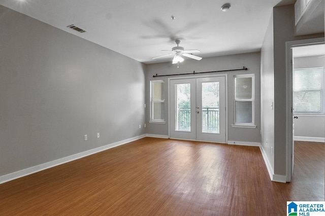 doorway to outside featuring french doors, ceiling fan, and hardwood / wood-style flooring