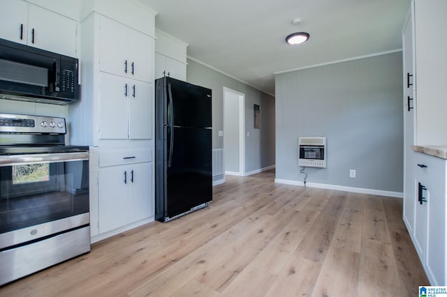 kitchen featuring black appliances, white cabinets, heating unit, and light wood-type flooring