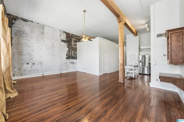 unfurnished living room featuring ceiling fan and dark hardwood / wood-style flooring