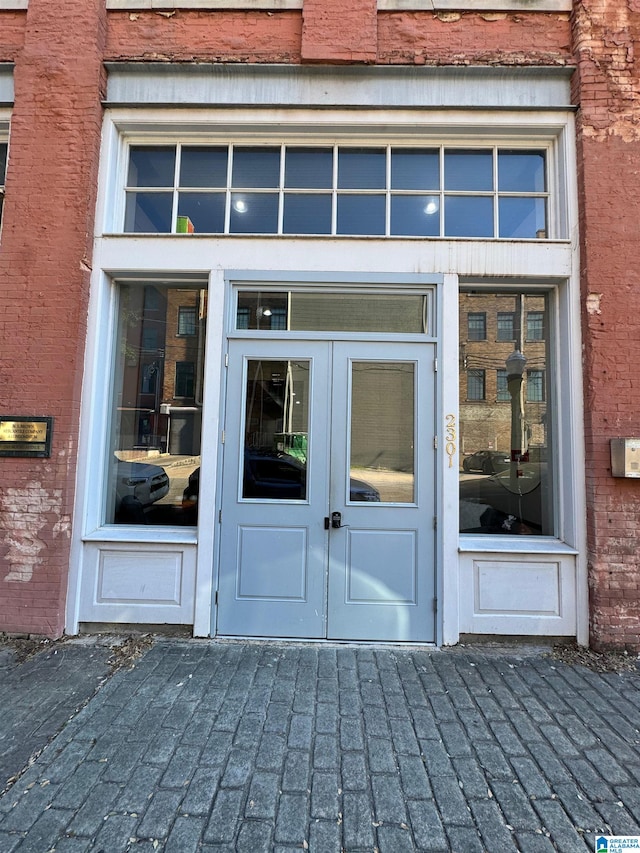 property entrance featuring french doors