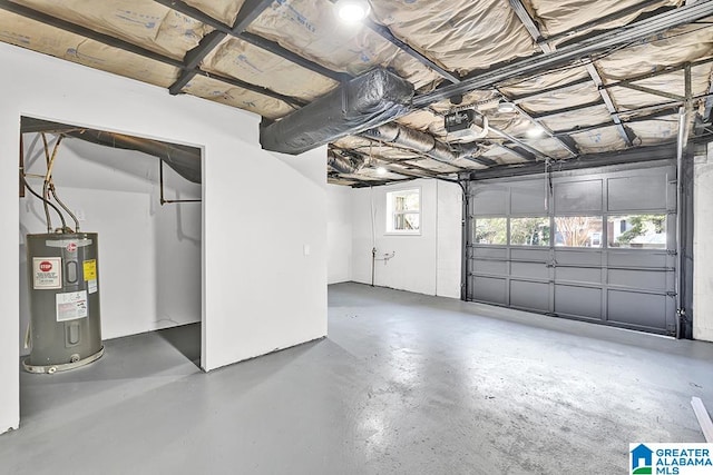 garage featuring a garage door opener and water heater