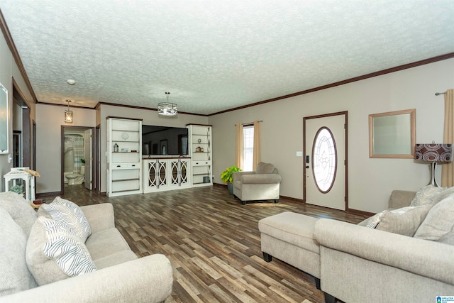 living room with crown molding, a textured ceiling, and hardwood / wood-style floors