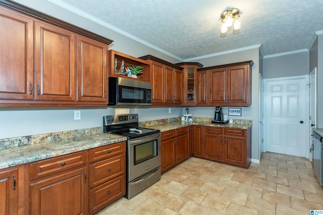 kitchen with crown molding, light stone countertops, stainless steel appliances, and a textured ceiling