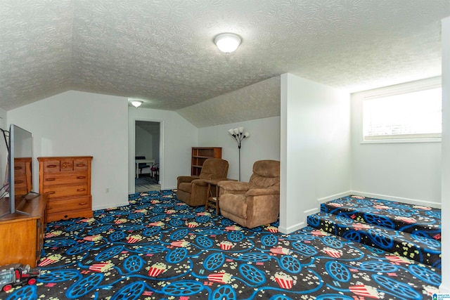 additional living space featuring a textured ceiling, carpet flooring, and vaulted ceiling