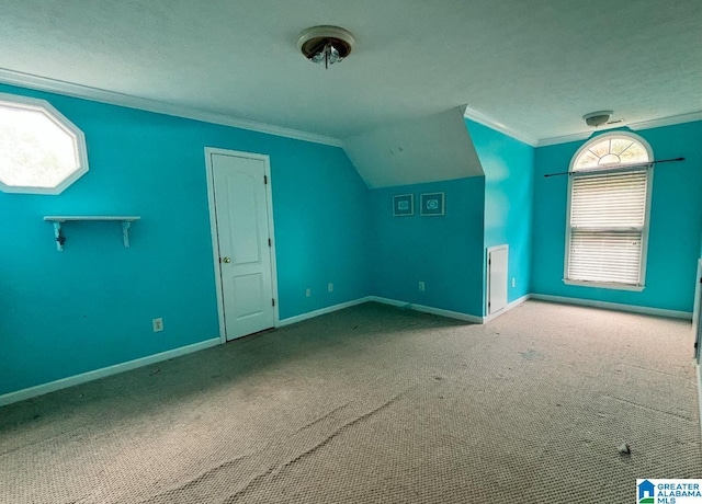 bonus room featuring carpet floors, plenty of natural light, and lofted ceiling