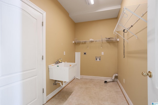 laundry area featuring sink, electric dryer hookup, and washer hookup