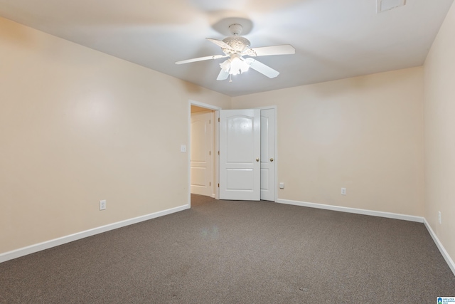 carpeted empty room with ceiling fan