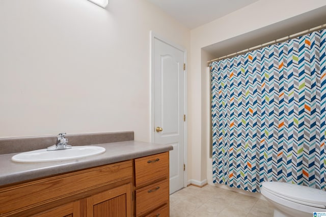 bathroom featuring vanity, toilet, tile patterned flooring, and a shower with shower curtain