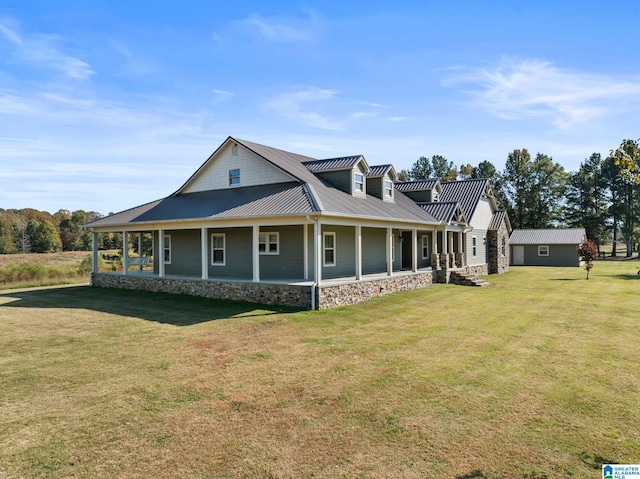 view of front of home with a front yard and a porch