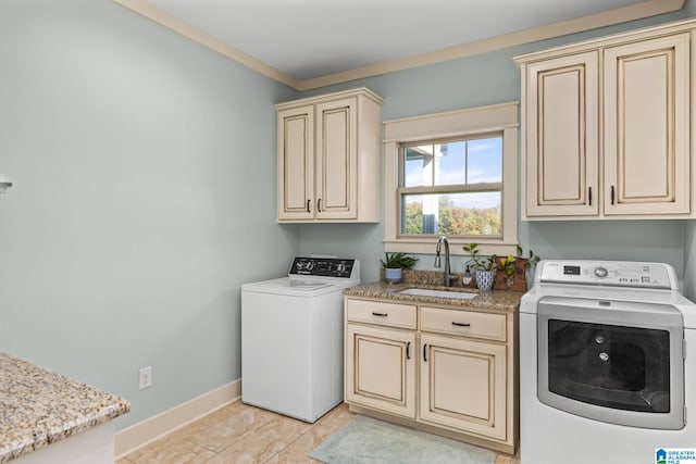 washroom featuring ornamental molding, sink, light tile patterned flooring, and cabinets