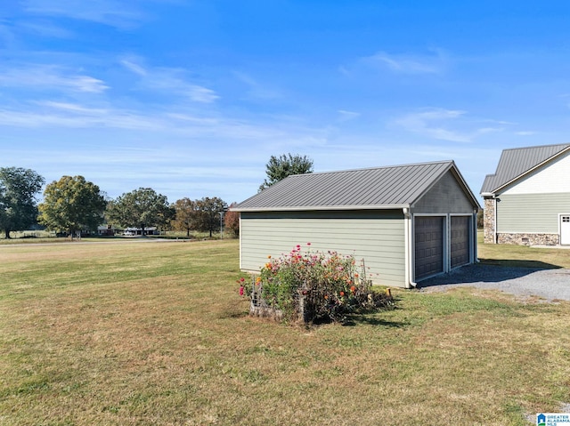 garage with a yard