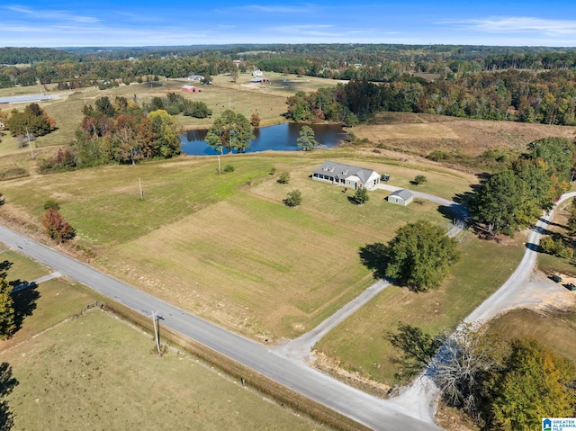 bird's eye view with a water view and a rural view