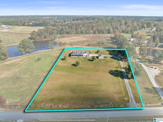 birds eye view of property featuring a water view and a rural view