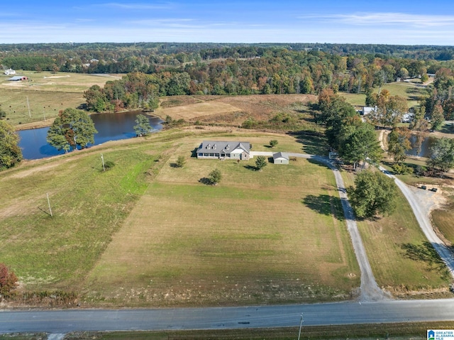 drone / aerial view featuring a water view and a rural view