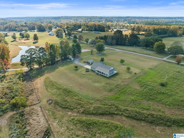 birds eye view of property with a rural view and a water view