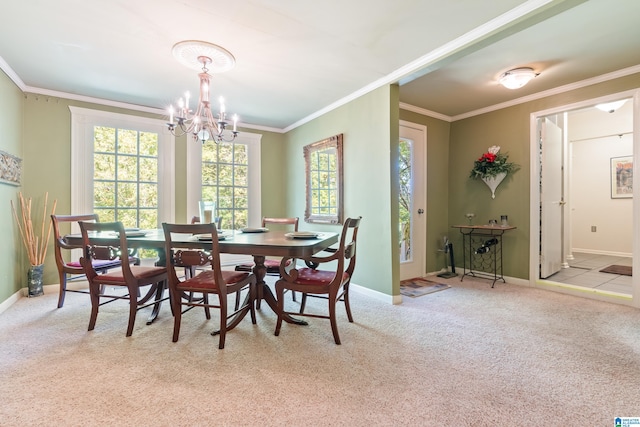 dining space with light carpet, a notable chandelier, ornamental molding, and a wealth of natural light