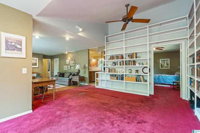 living area with ceiling fan and carpet flooring