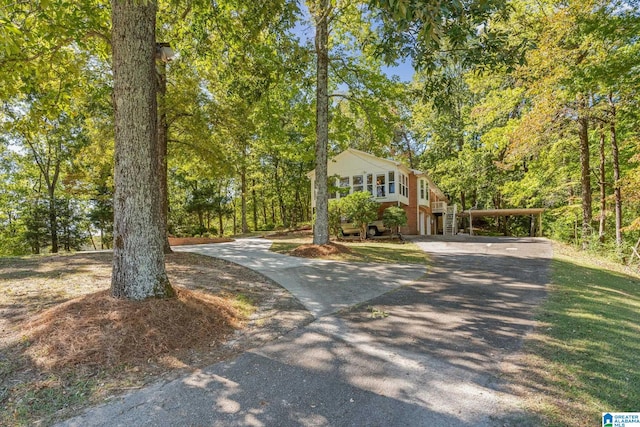 view of front of home with a carport