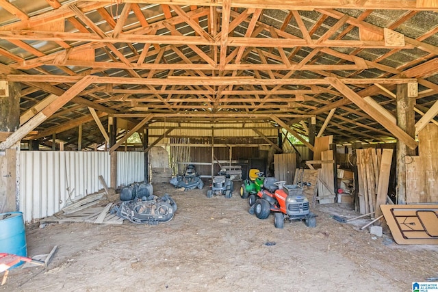 miscellaneous room featuring lofted ceiling