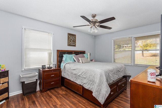 bedroom featuring dark wood-type flooring and ceiling fan