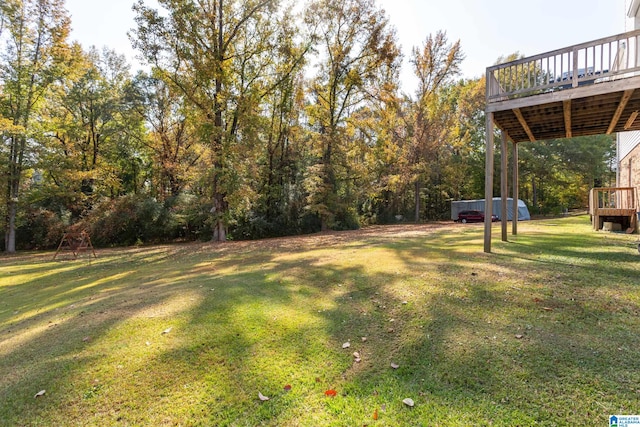 view of yard featuring a deck