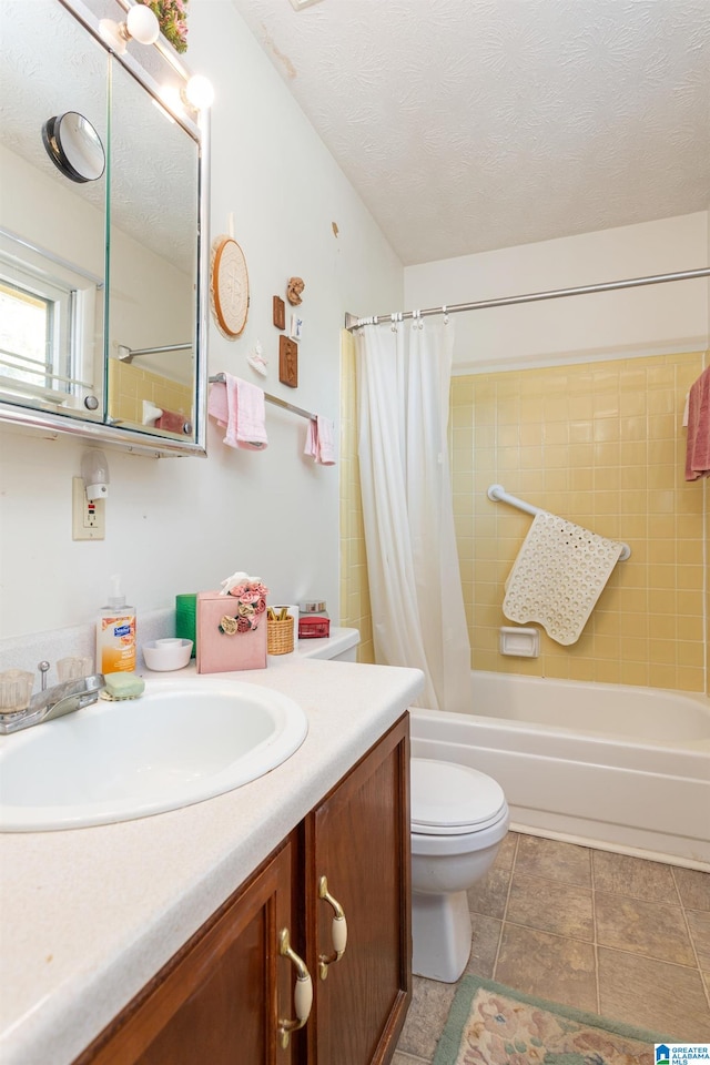 full bathroom featuring vanity, shower / bath combination with curtain, a textured ceiling, and toilet