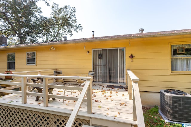 wooden deck with central AC unit