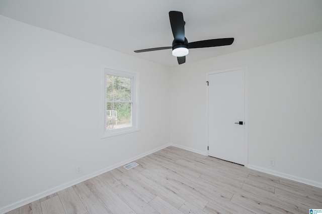 unfurnished room with light hardwood / wood-style flooring and ceiling fan