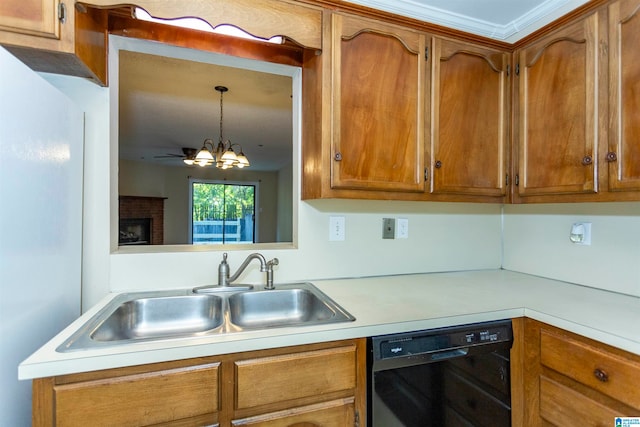 kitchen featuring black dishwasher, ornamental molding, sink, a notable chandelier, and a fireplace