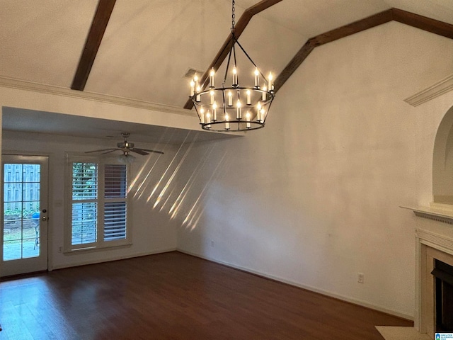 unfurnished dining area with vaulted ceiling with beams, a premium fireplace, dark hardwood / wood-style floors, crown molding, and ceiling fan