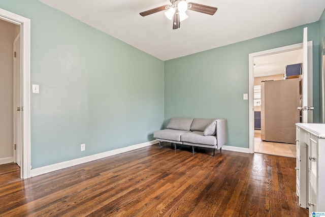 unfurnished room featuring wood-type flooring and ceiling fan