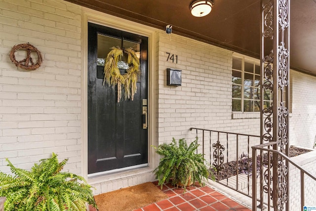 entrance to property with a porch