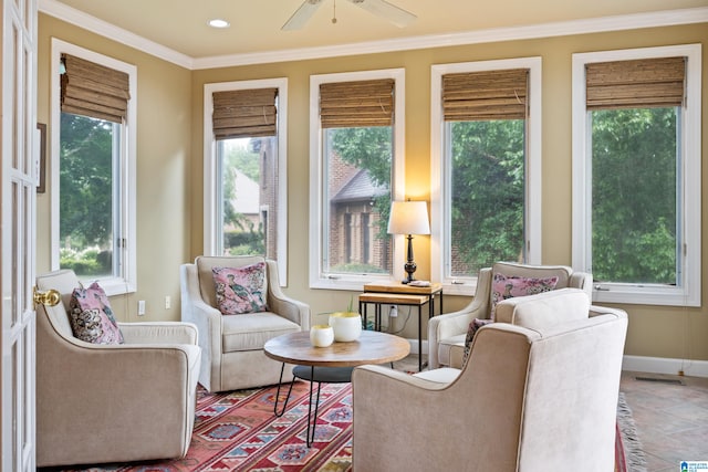 sunroom with ceiling fan