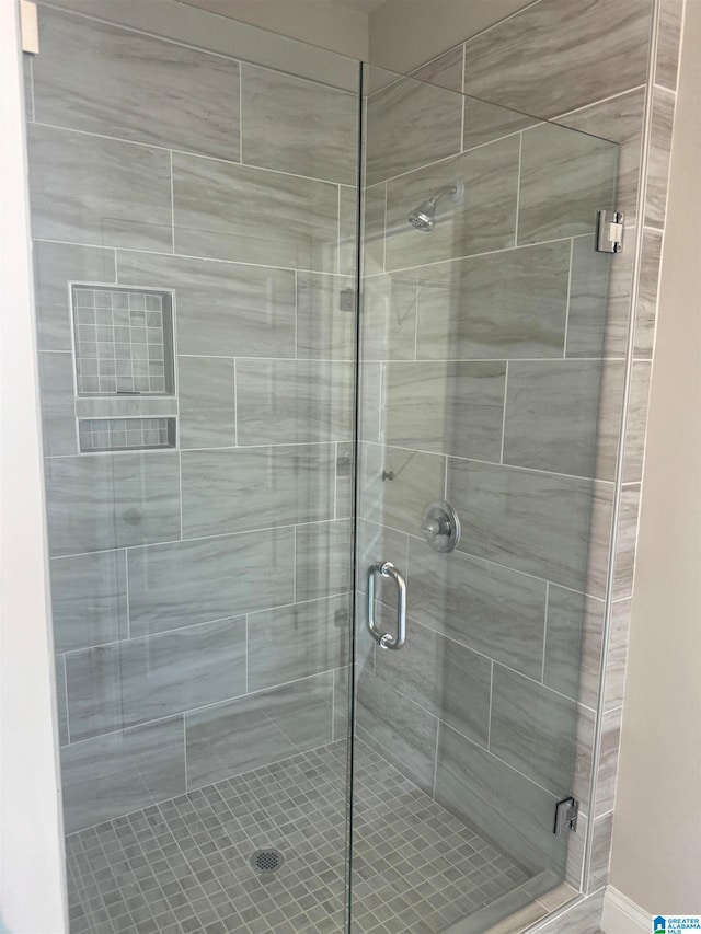 bathroom with a stall shower