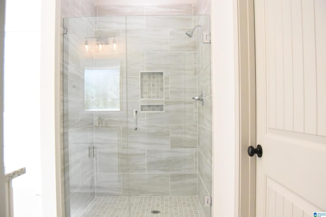 full bathroom with a stall shower