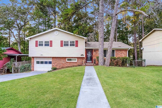 5268 Goldmar Dr, Irondale, AL 35210 - split level home featuring driveway, a garage, and brick siding