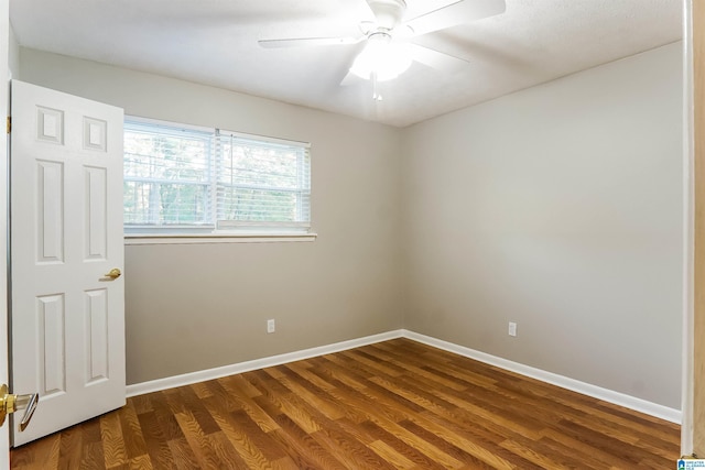 5268 Goldmar Dr, Irondale, AL 35210 - unfurnished room featuring dark wood-style flooring, baseboards, and a ceiling fan