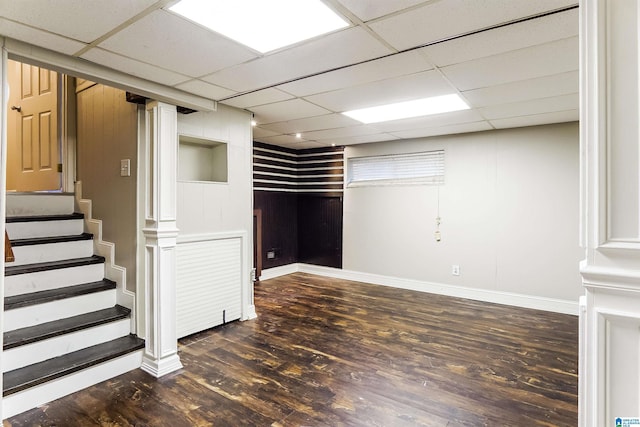 5268 Goldmar Dr, Irondale, AL 35210 - finished below grade area featuring baseboards, dark wood-style flooring, stairway, and a paneled ceiling