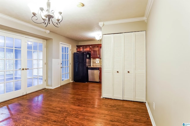 5268 Goldmar Dr, Irondale, AL 35210 - kitchen featuring freestanding refrigerator, stainless steel dishwasher, a chandelier, ornamental molding, and dark wood-style flooring