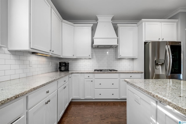 kitchen featuring custom exhaust hood, white cabinetry, stainless steel appliances, and dark wood-type flooring