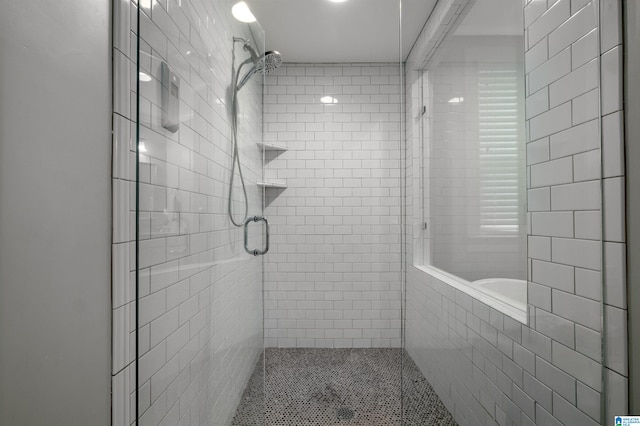 bathroom featuring an enclosed shower