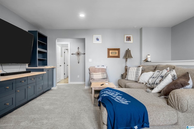 living room featuring light carpet