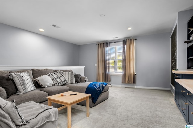 living room with light colored carpet