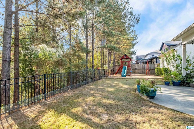 view of yard with a playground