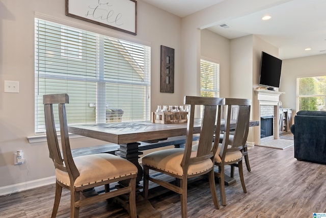 dining space featuring hardwood / wood-style flooring