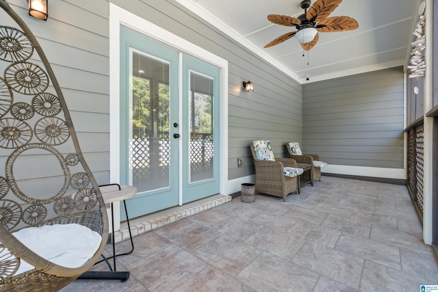 exterior space featuring ceiling fan